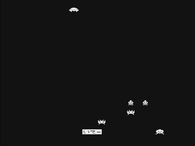 Mini Vaders. An invader is at the bottom of the screen, so the player becomes Japanese text.
