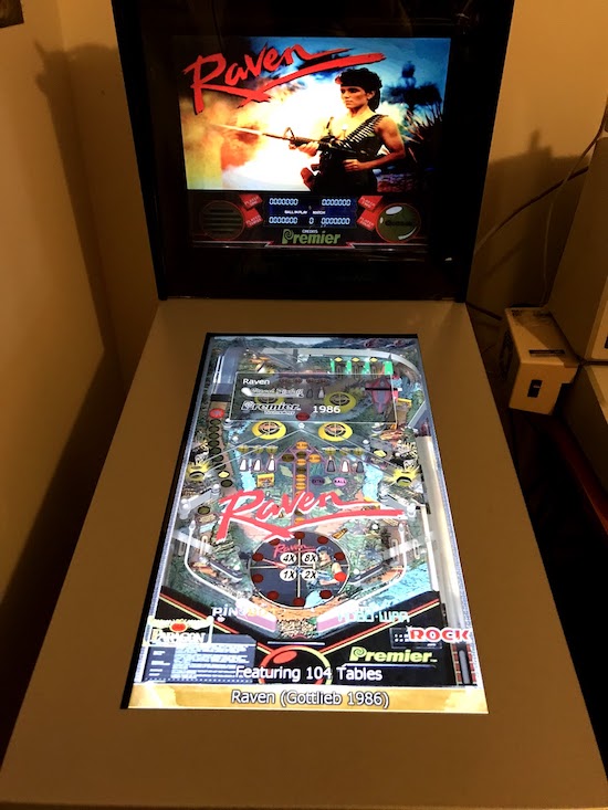 The modded pinball showing two screens and the Gottlieb game 'Raven' and the wide bezel
